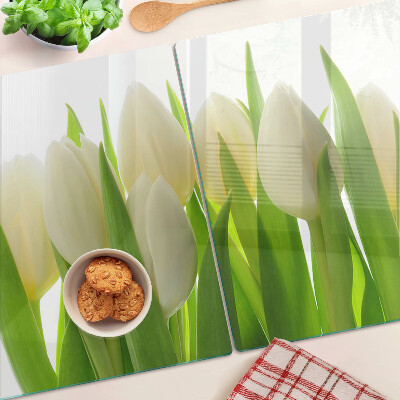 Skleněná deska do kuchyně Tulipány na pozadí zelených listů