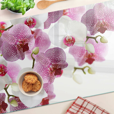 Krájecí prkénko skleněné Orchideje v pozadí okna