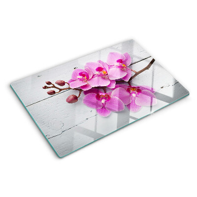 Skleněná deska do kuchyně Orchideje na bílém pozadí