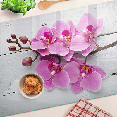 Skleněná deska do kuchyně Orchideje na bílém pozadí