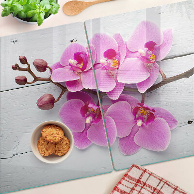 Skleněná deska do kuchyně Orchideje na bílém pozadí