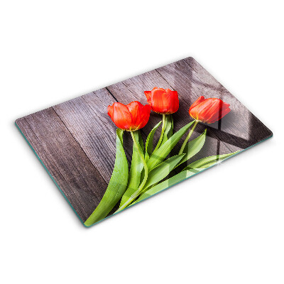 Skleněná deska do kuchyně Tulipány na dřevěném pozadí