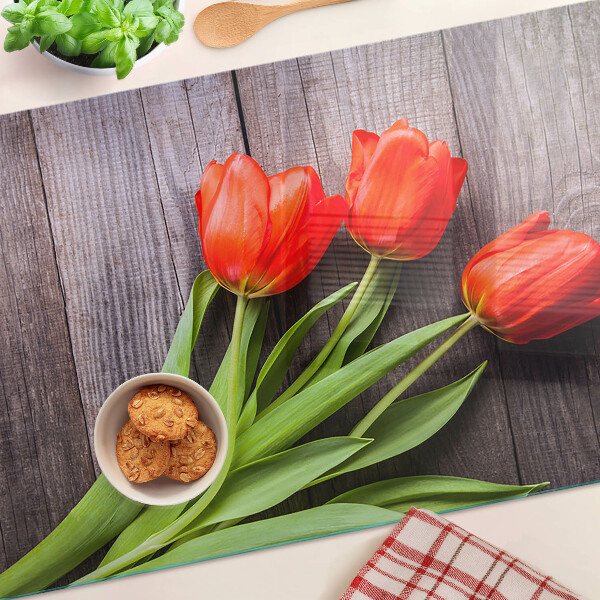 Skleněná deska do kuchyně Tulipány na dřevěném pozadí