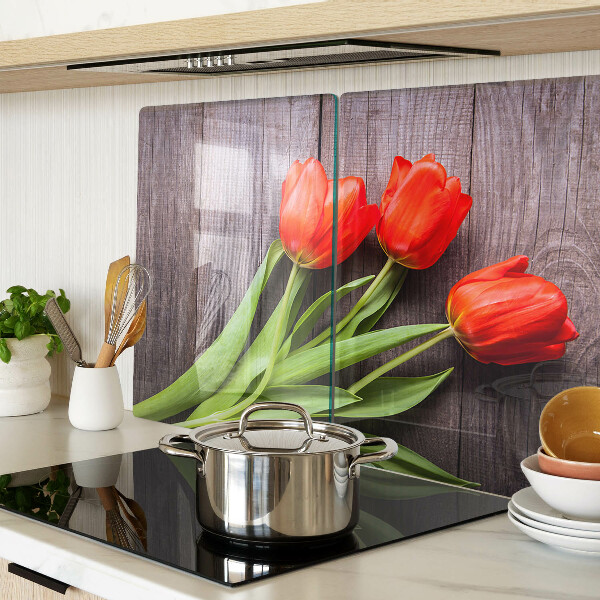 Skleněná deska do kuchyně Tulipány na dřevěném pozadí