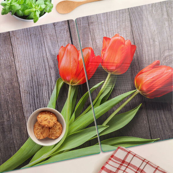 Skleněná deska do kuchyně Tulipány na dřevěném pozadí
