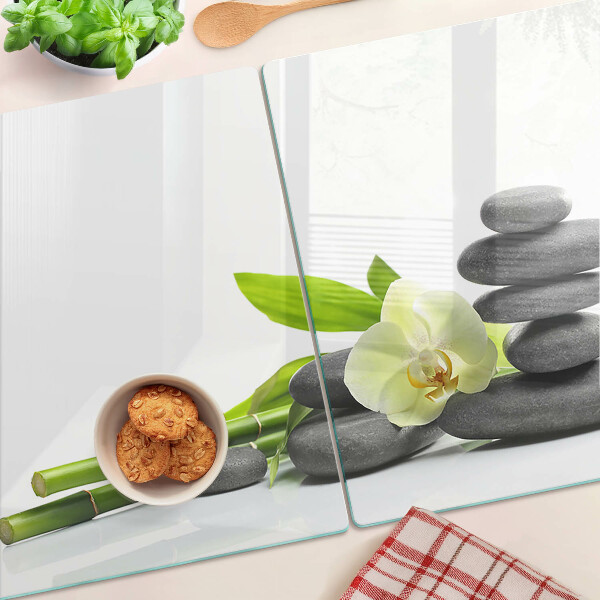 Skleněná krájecí deska Orchidej a lázeňské kameny