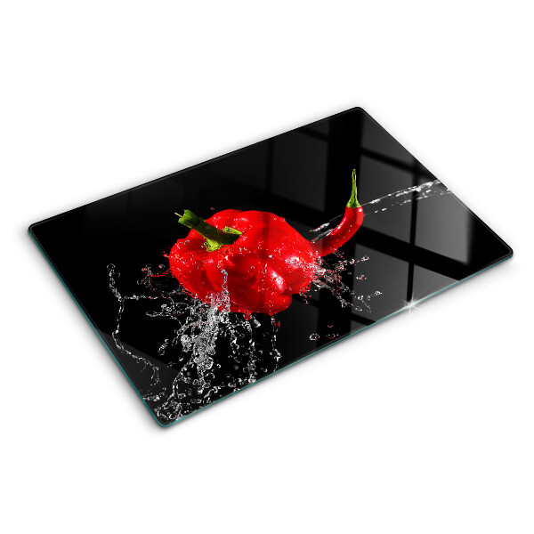 Skleněná krájecí deska Červená paprika ve vodě
