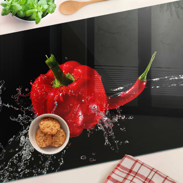 Skleněná krájecí deska Červená paprika ve vodě