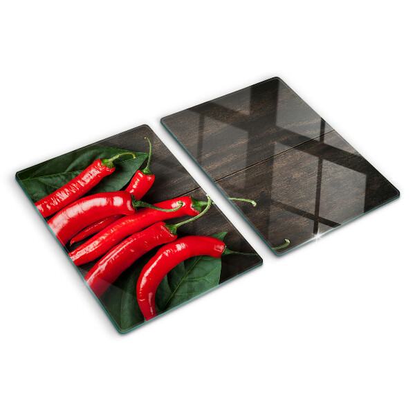 Skleněné krájecí prkénko Chilli papričky na dřevěném pozadí