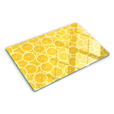 Skleněná krájecí deska Plátky citronu na žlutém pozadí