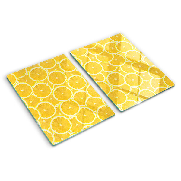 Skleněná krájecí deska Plátky citronu na žlutém pozadí