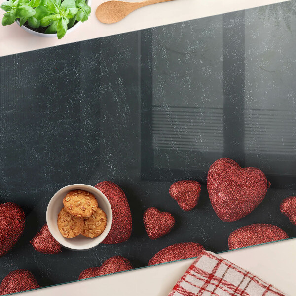 Krájecí prkénko skleněné Červená srdce na tmavém pozadí