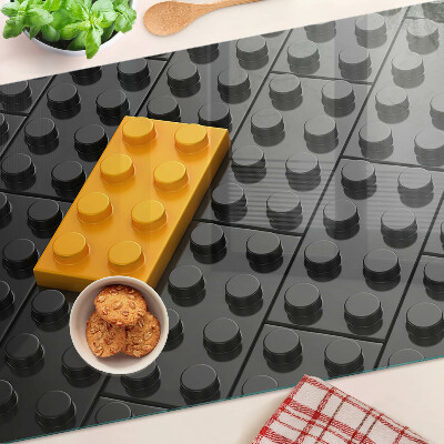 Krájecí prkénko skleněné LEGO kostky na černém pozadí