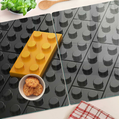 Krájecí prkénko skleněné LEGO kostky na černém pozadí