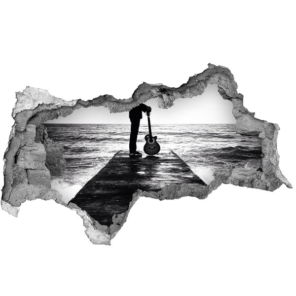 Fototapeta díra na zeď Hudebník na molu