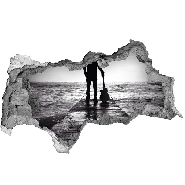 Fototapeta díra na zeď Kytarista na molo