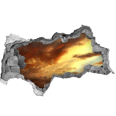 Fototapeta díra na zeď Západ slunce skrz díru ve zdi