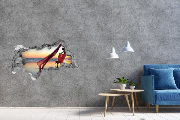 Fototapeta díra na zeď Tanec na pláži při západu slunce