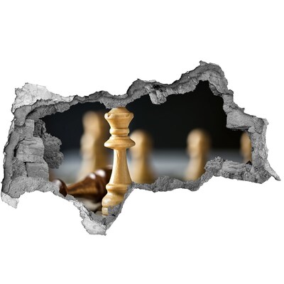 Foto fotografie díra na zeď Hraní šachů dírou ve zdi