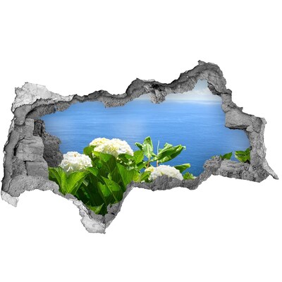 Nálepka fototapeta 3D Výhled na moře skrz díru ve zdi