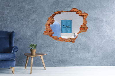 Fototapeta díra na zeď Rozbitá zeď s modrými dveřmi