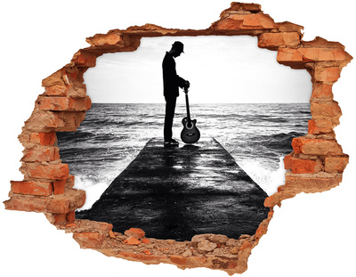 Fototapeta díra na zeď Hudebník na molu