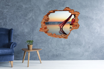 Fototapeta díra na zeď Tanec na pláži při západu slunce