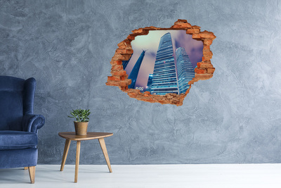 Fototapeta díra na zeď 3D Moderní město skrz díru ve zdi