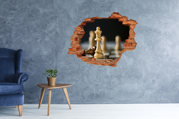 Foto fotografie díra na zeď Hraní šachů dírou ve zdi