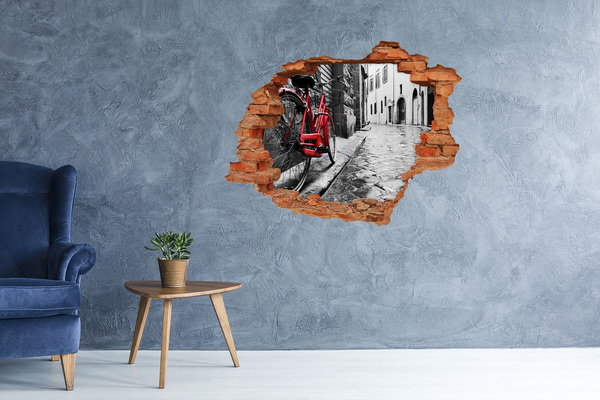 Díra 3D foto tapeta nálepka Červené kolo v okouzlující ulici