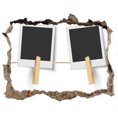 Foto fotografie díra na zeď Poškozená zeď s obrazovými rámy