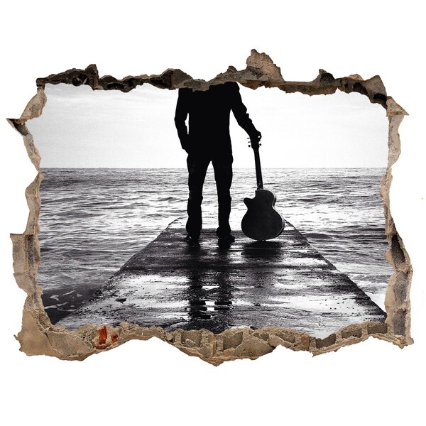 Fototapeta díra na zeď Hudebník na molu