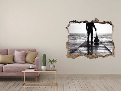 Fototapeta díra na zeď Hudebník na molu