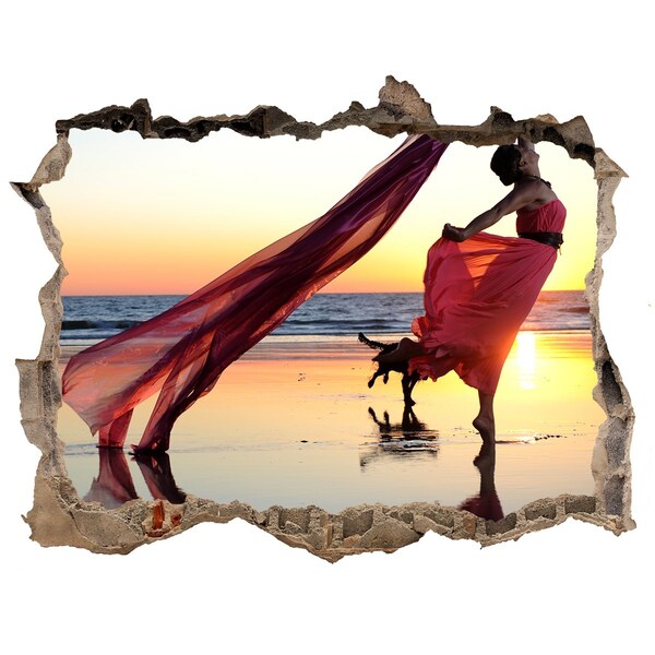 Fototapeta díra na zeď Tanec na pláži při západu slunce