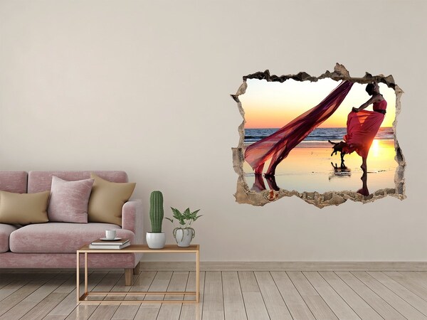 Fototapeta díra na zeď Tanec na pláži při západu slunce