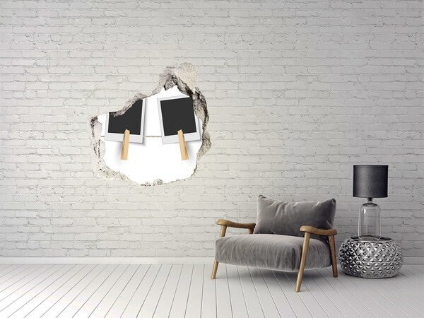 Foto fotografie díra na zeď Poškozená zeď s obrazovými rámy