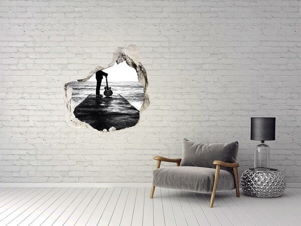 Fototapeta díra na zeď Hudebník na molu