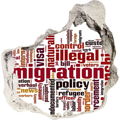Fototapeta díra na zeď Migrační politika