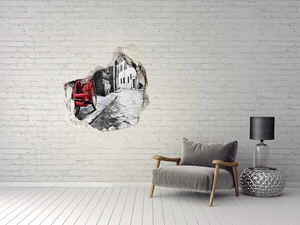 Díra 3D foto tapeta nálepka Červené kolo v okouzlující ulici