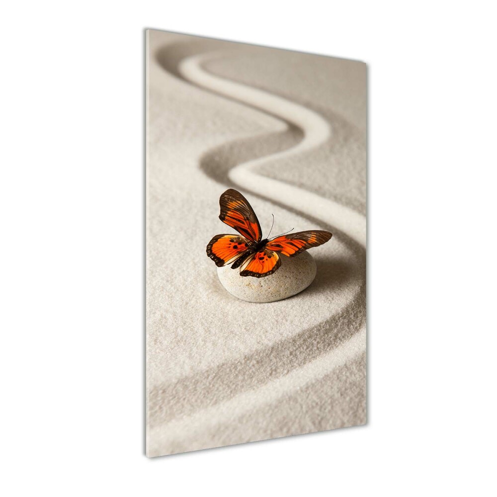 Foto obraz akrylový vertikální Kámen zen a motýl
