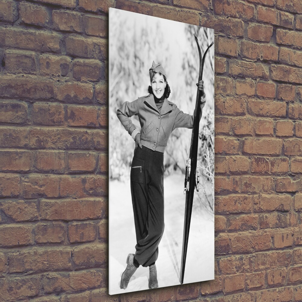 Vertikální Fotoobraz na skle Žena s lyžema