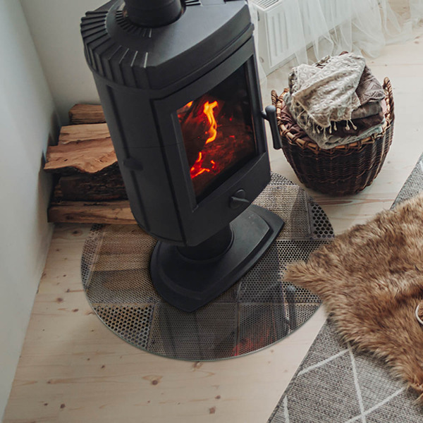 Kulatá skleněná podložka pod kamna Motiv perforované oceli