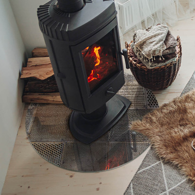 Kulatá skleněná podložka pod kamna Motiv perforované oceli