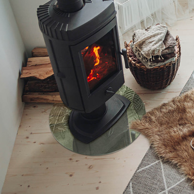 Kulatá skleněná podložka pod kamna Tropické listy na pozadí