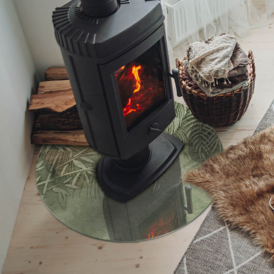 Kulatá skleněná podložka pod kamna Tropické listy na pozadí