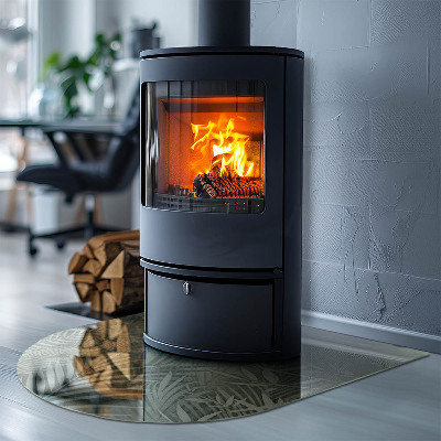 Půloválná skleněná podložka pod kamna Tropické listy na pozadí