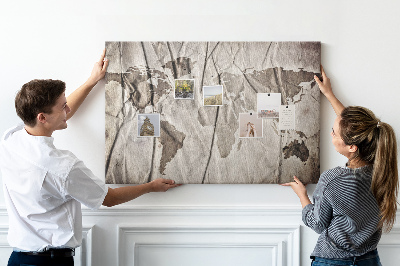 Nástěnka Poškozená mapa světa na papírovém pozadí
