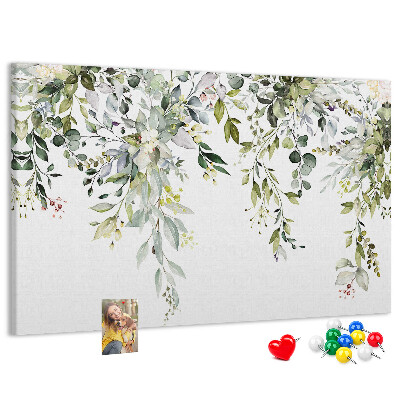 Nástěnka Zelené listy a jemné květiny v pozadí