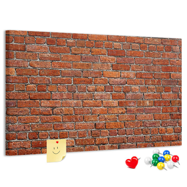 Nástěnka Cihlová zeď v teplých odstínech.