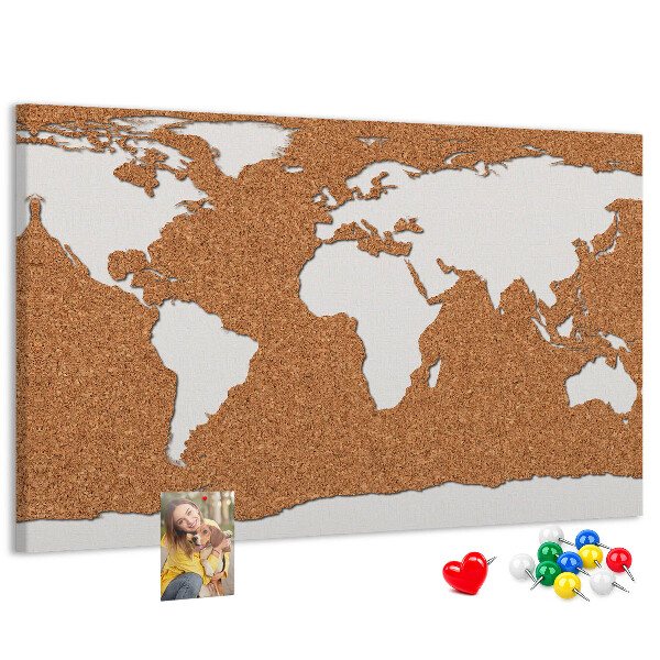 Nástěnka Mapa světa z korku připnutá na špendlík.